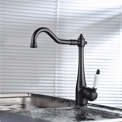 Black Sink With Brushed Nickel Faucet